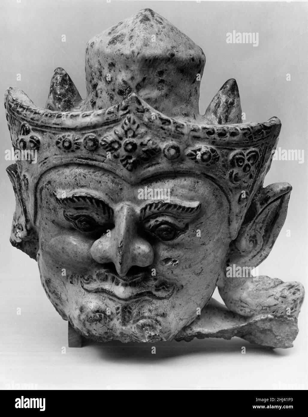 Testa di un gigante 13th–14th secolo Thailandia. Testa di un Gigante 37660 Foto Stock