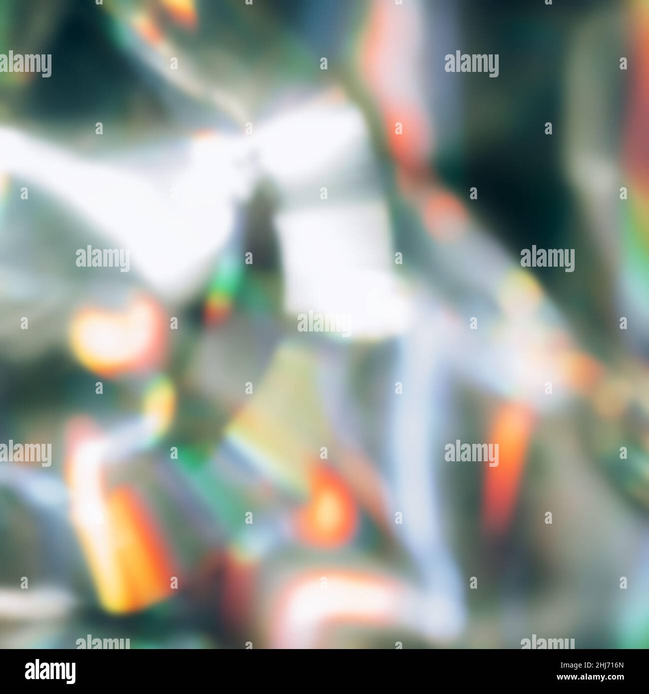 Sfondo olografico al neon. Riflessione dell'arcobaleno, foto sfocata Foto Stock