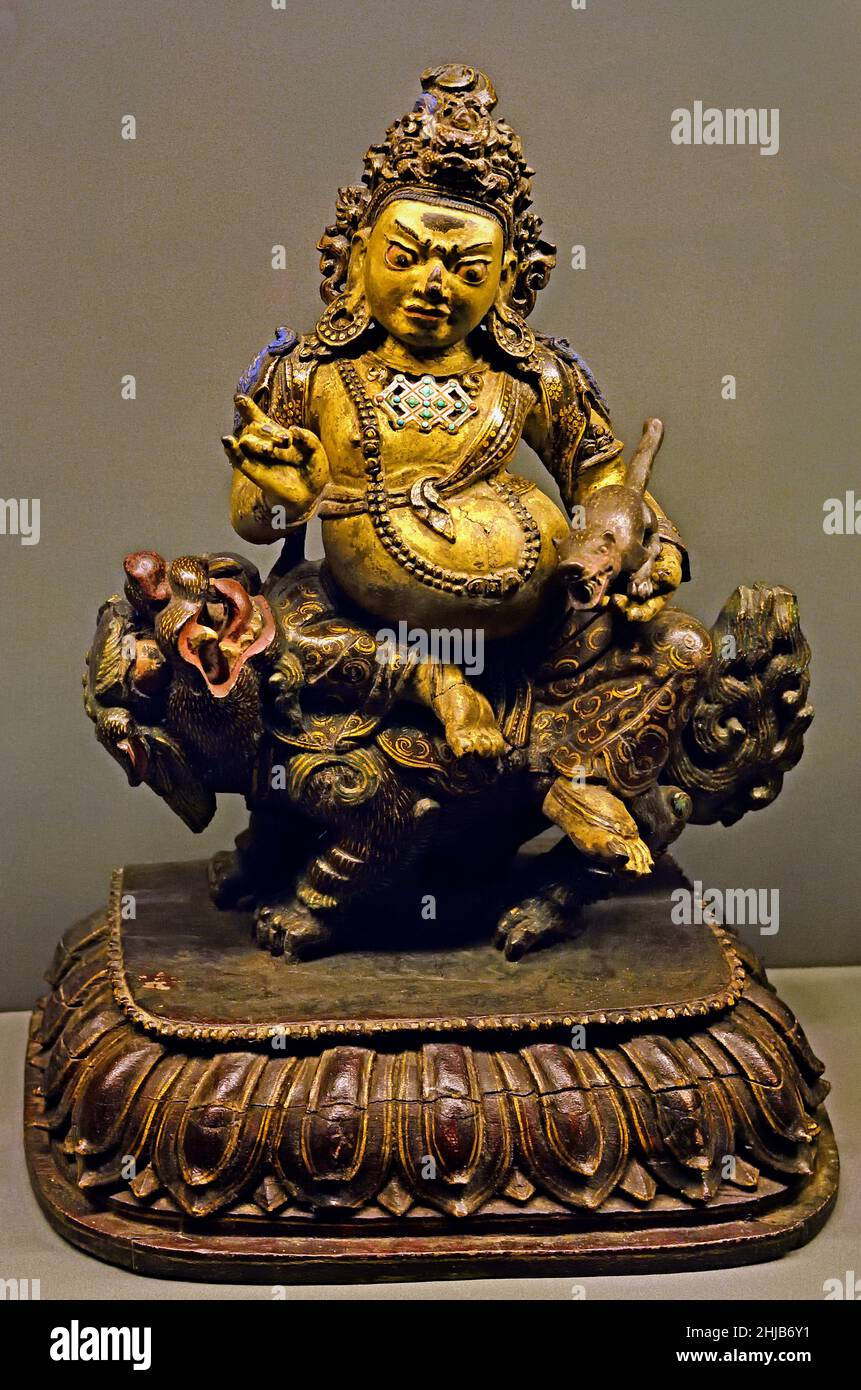 Vaishravana Kubera - Vaisravana Kubera sino Tibet arte tibetana 17th secolo laccata, dorata e dipinta legno Tibet. Foto Stock