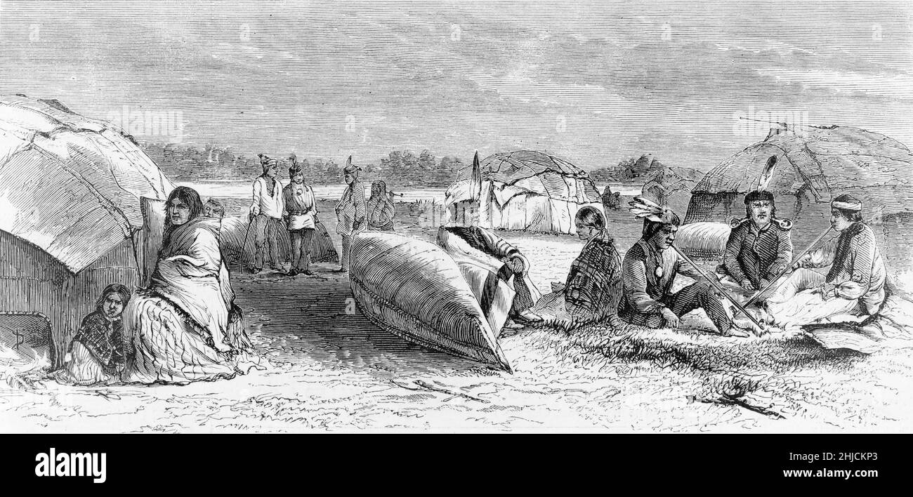 Gli Americani nativi in campo con wigwams di betulla-corteccia e canoe. Incisione in legno da Harper's Weekly, 5 agosto 1871. Foto Stock