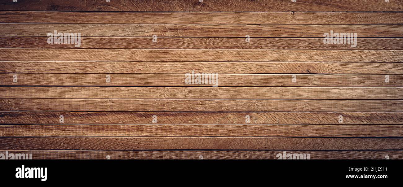 Legno texture sfondo. Asse di quercia è accatastato sopra l'uno dell'altro Foto Stock