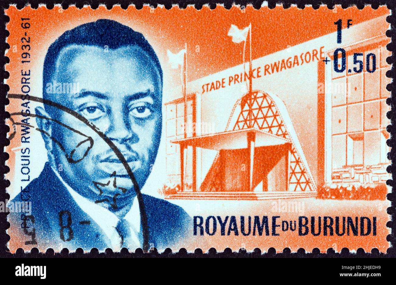 BURUNDI - CIRCA 1963: Un francobollo stampato in Burundi dal numero "Prince Rwagasore Memorial and Stadium Fund" mostra Prince and Stadium, circa 1963. Foto Stock