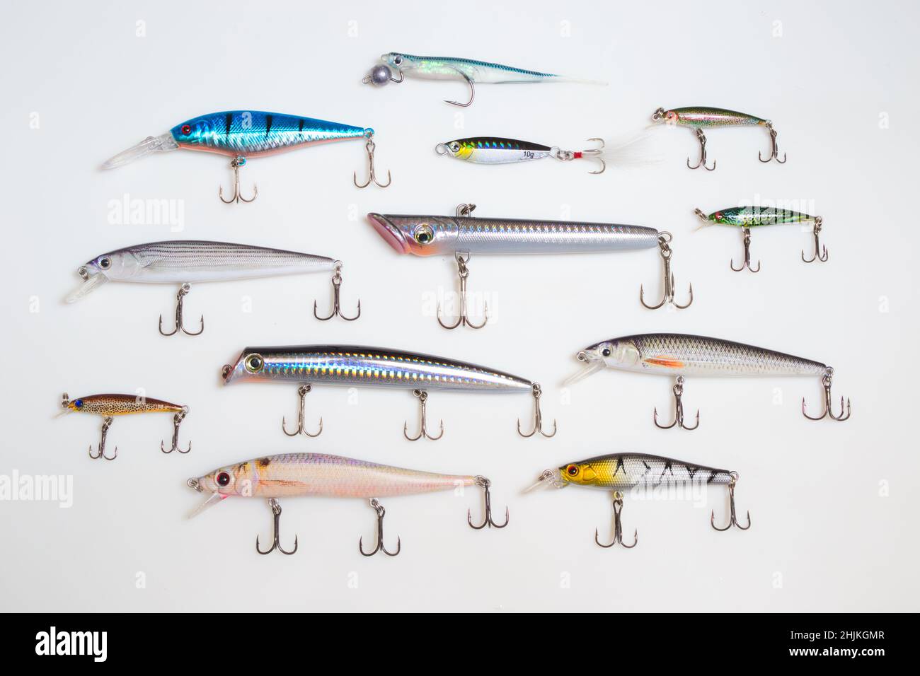 Pesca Lures con ganci su sfondo bianco Foto Stock