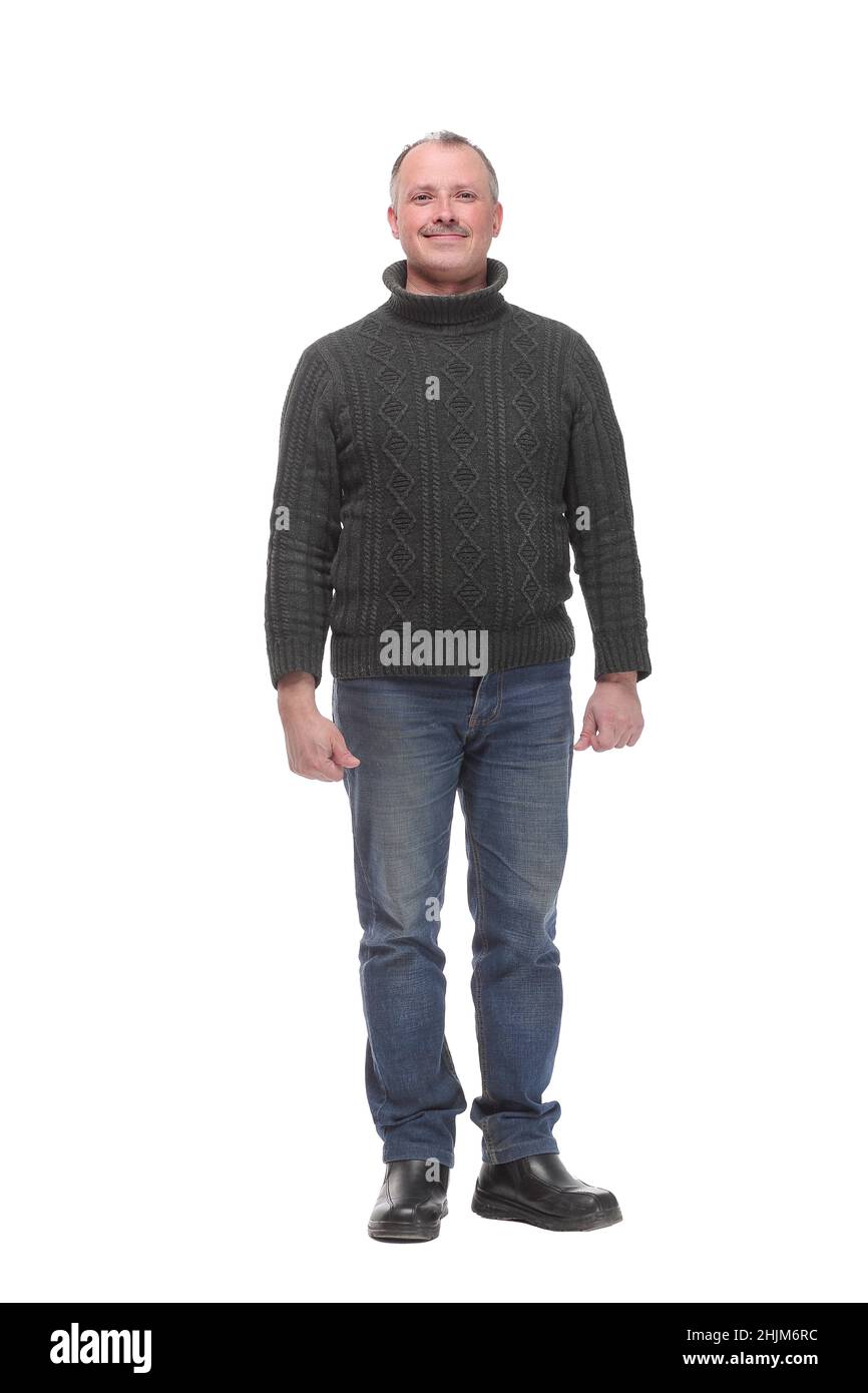 Vista frontale di uomo felice sorridente indossando jeans. Foto Stock