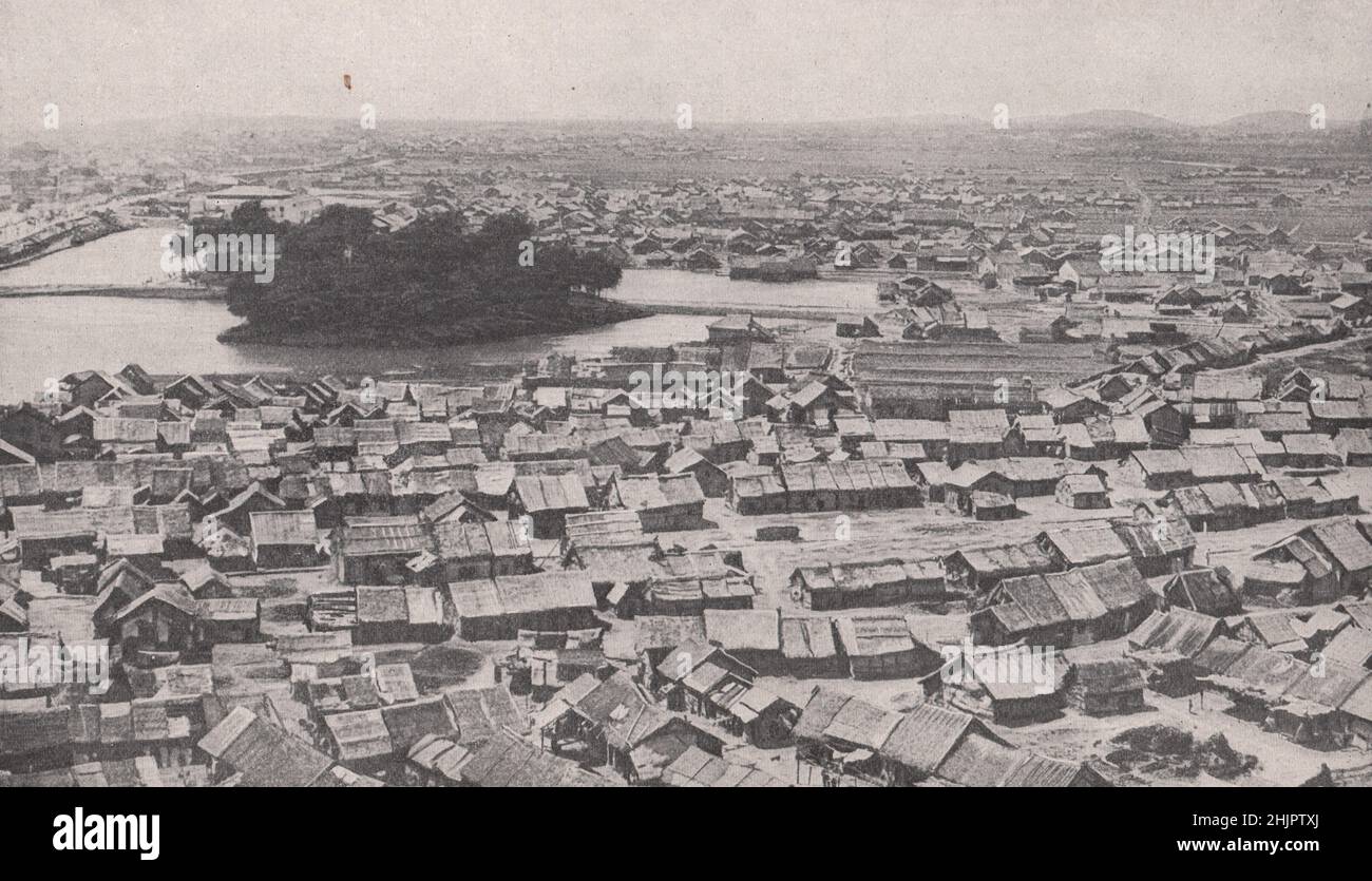Sordido distesa di coveli miserabili nel quartiere natale del porto trattato di Hankau. Cina (1923) Foto Stock