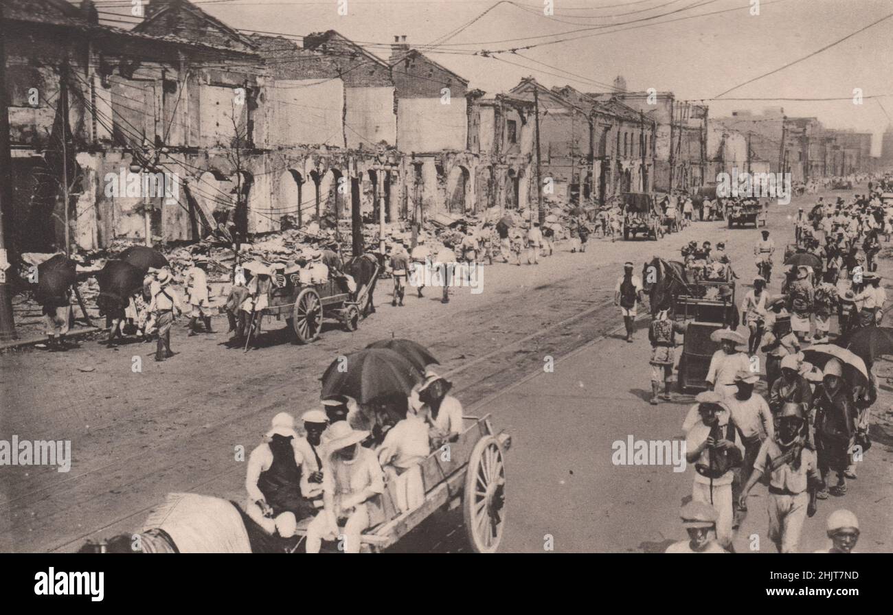 Giappone terremoto 1923: Cavalli-cart ha preso il posto di automobili e altre moderne locomotion dopo il disastro (Una vista sulla Ginza) Foto Stock