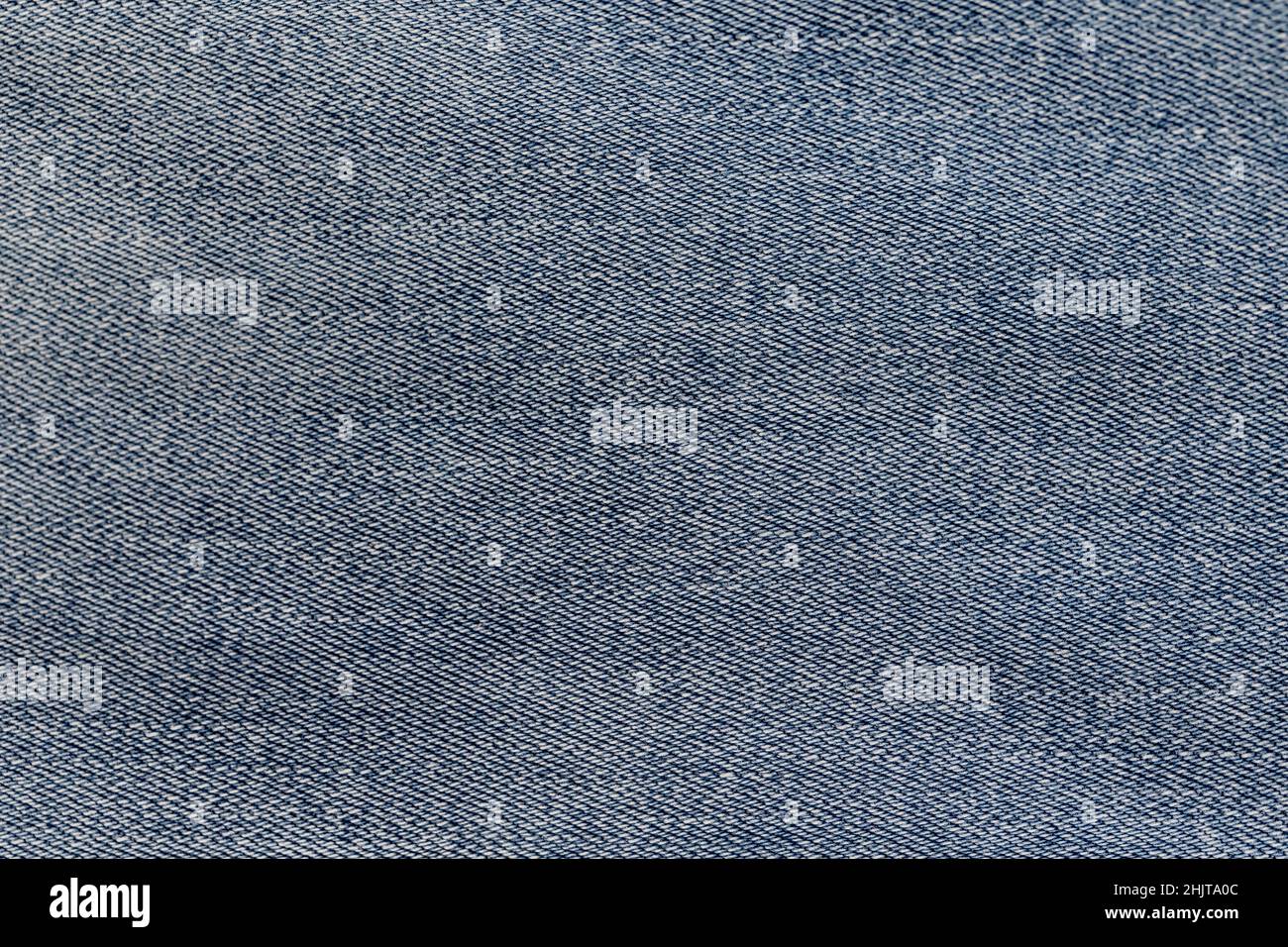 Primo piano tessuto jeans blu Foto Stock