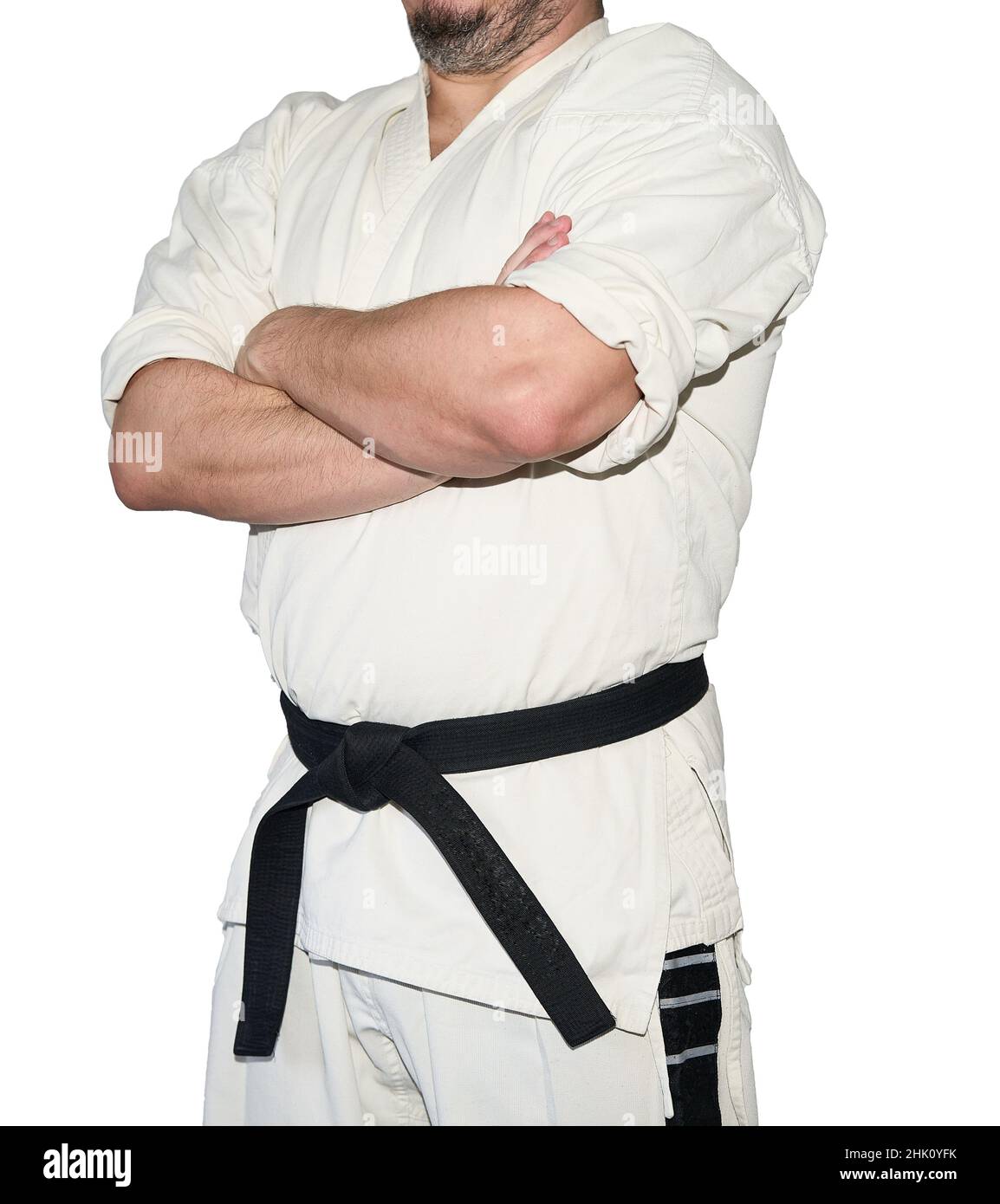 Uomo in bianco kimono con cintura nera di karate allenamento in palestra  Foto stock - Alamy