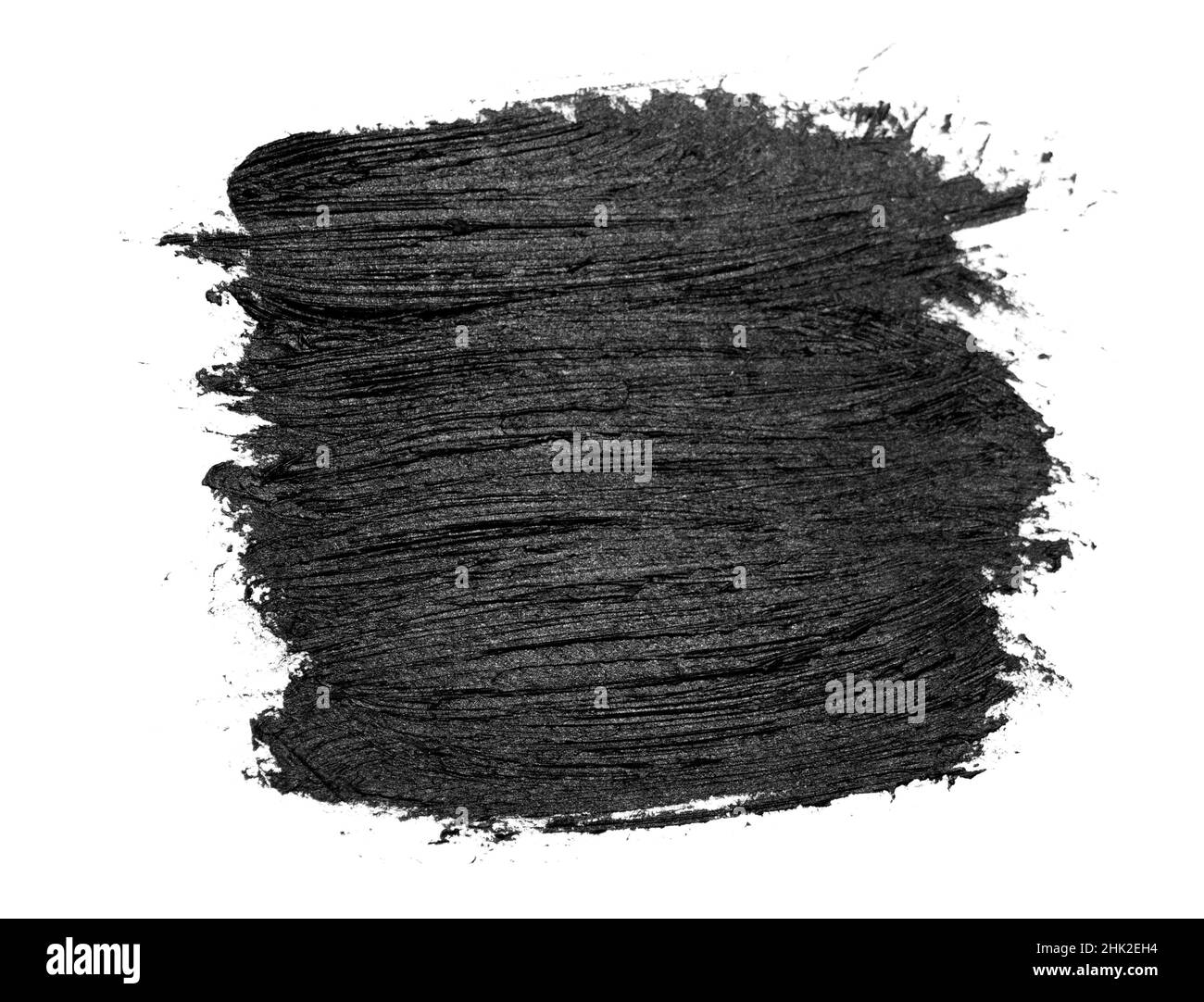 Pennellate nere su carta bianca. Isolato su sfondo bianco. Foto Stock
