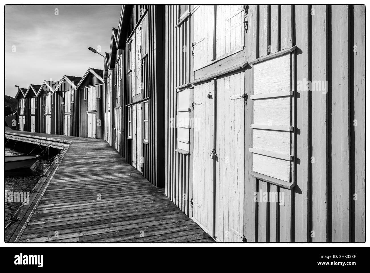 Svezia, Bohuslan, Smogen, Smogenbrygan, case di barche antiche e baracche da pesca Foto Stock