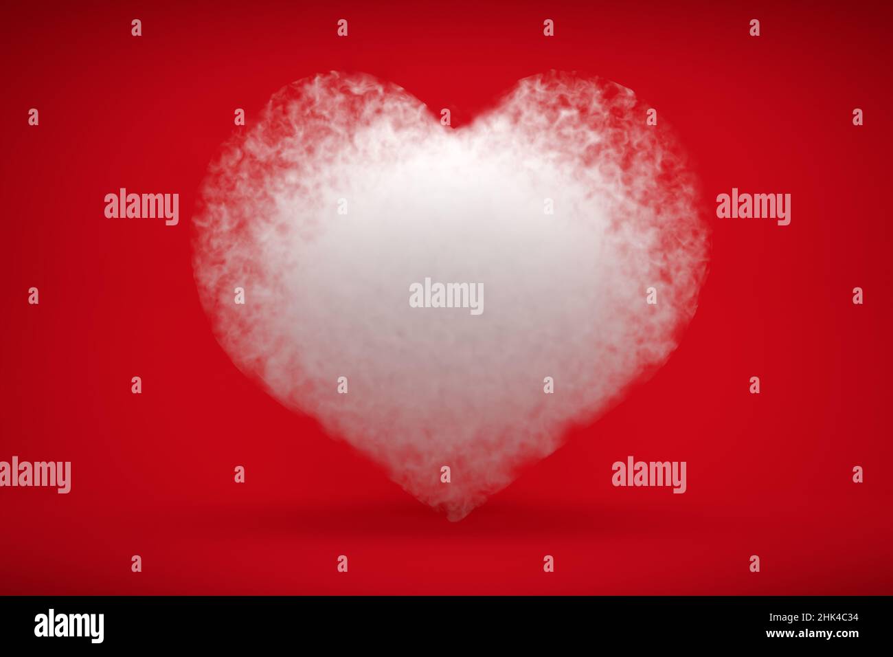 Una nuvola a forma di cuore davanti a uno sfondo rosso. San Valentino o matrimonio concetto. Foto Stock