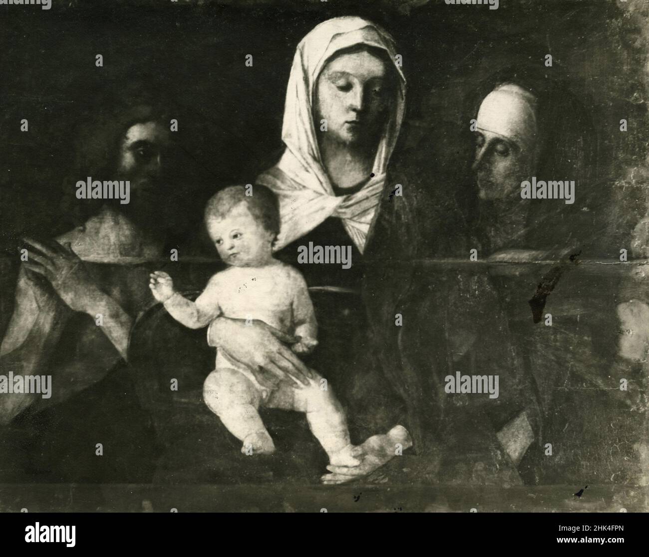 La Vergine Maria con Gesù Bambino, Sant'Anna e San Giovanni Battista, dipinto dall'artista italiano Giovanni Bellini, Urbino, Italia 1920s Foto Stock