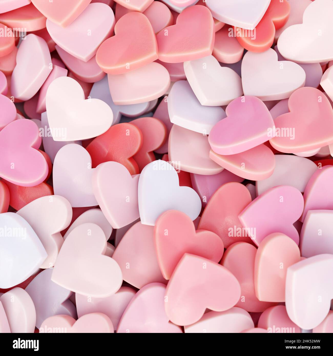 3D rendering di un mucchio di caramelle rosate e rosate a forma di cuore visto dall'alto Foto Stock
