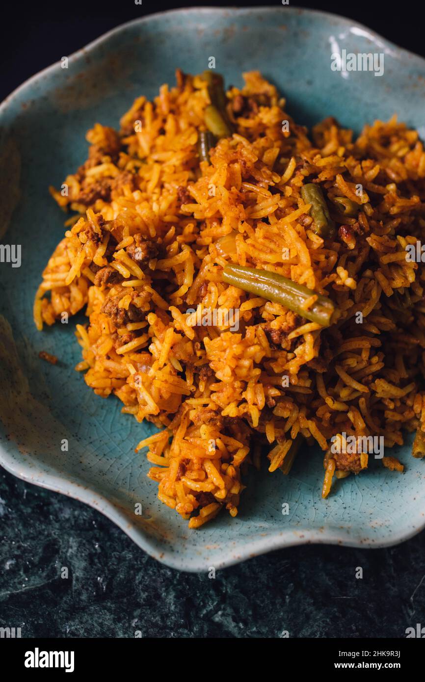 Polo di Lubia piatto di riso persiano con manzo macinato, fagioli verdi, curcuma Foto Stock