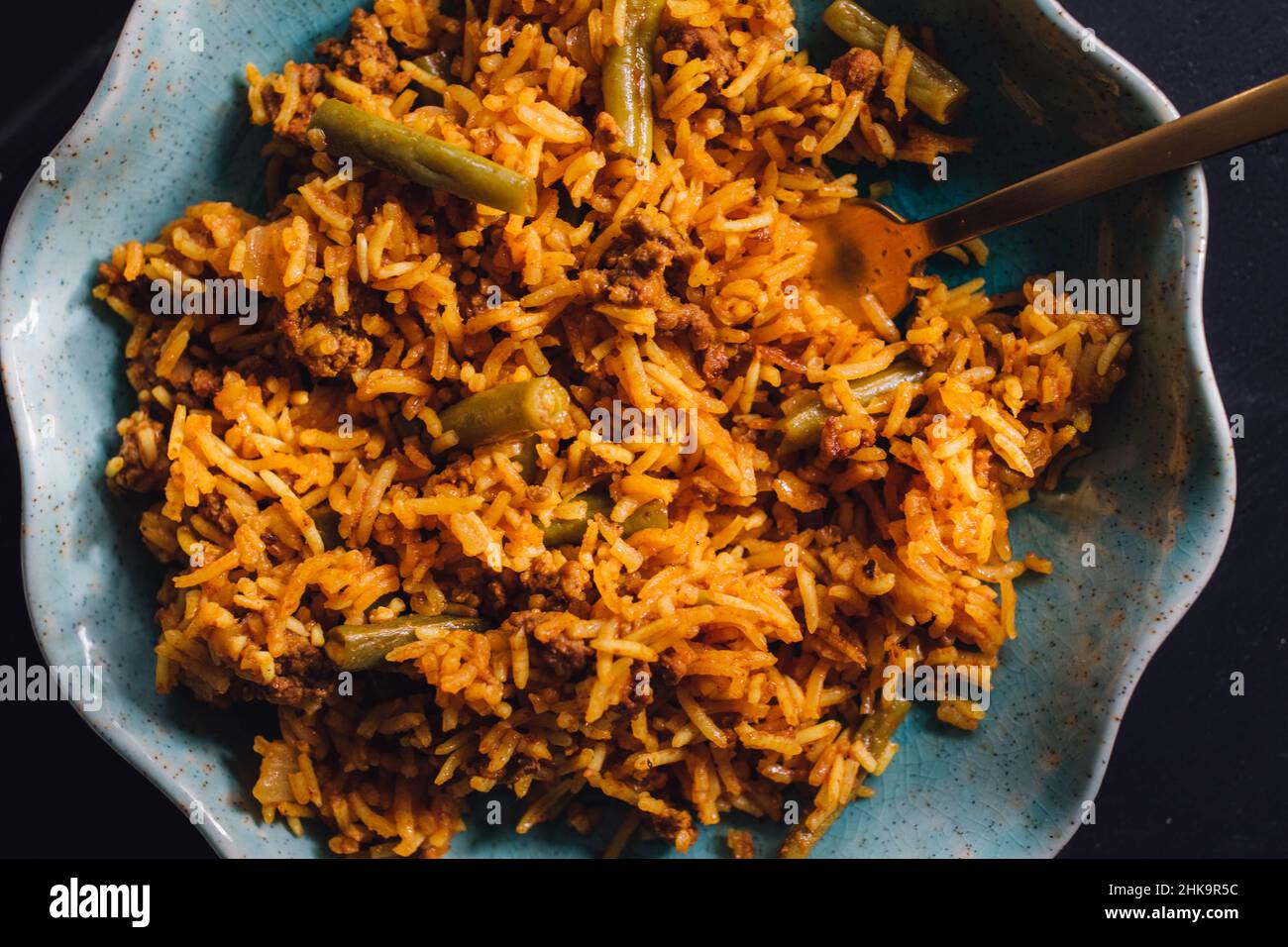 Polo di Lubia piatto di riso persiano con manzo macinato, fagioli verdi, curcuma Foto Stock