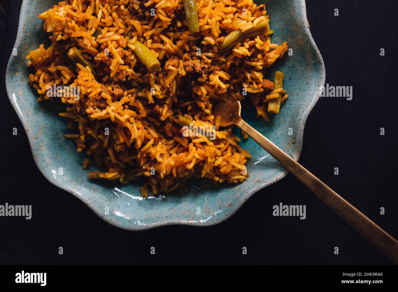 Polo di Lubia piatto di riso persiano con manzo macinato, fagioli verdi, curcuma Foto Stock