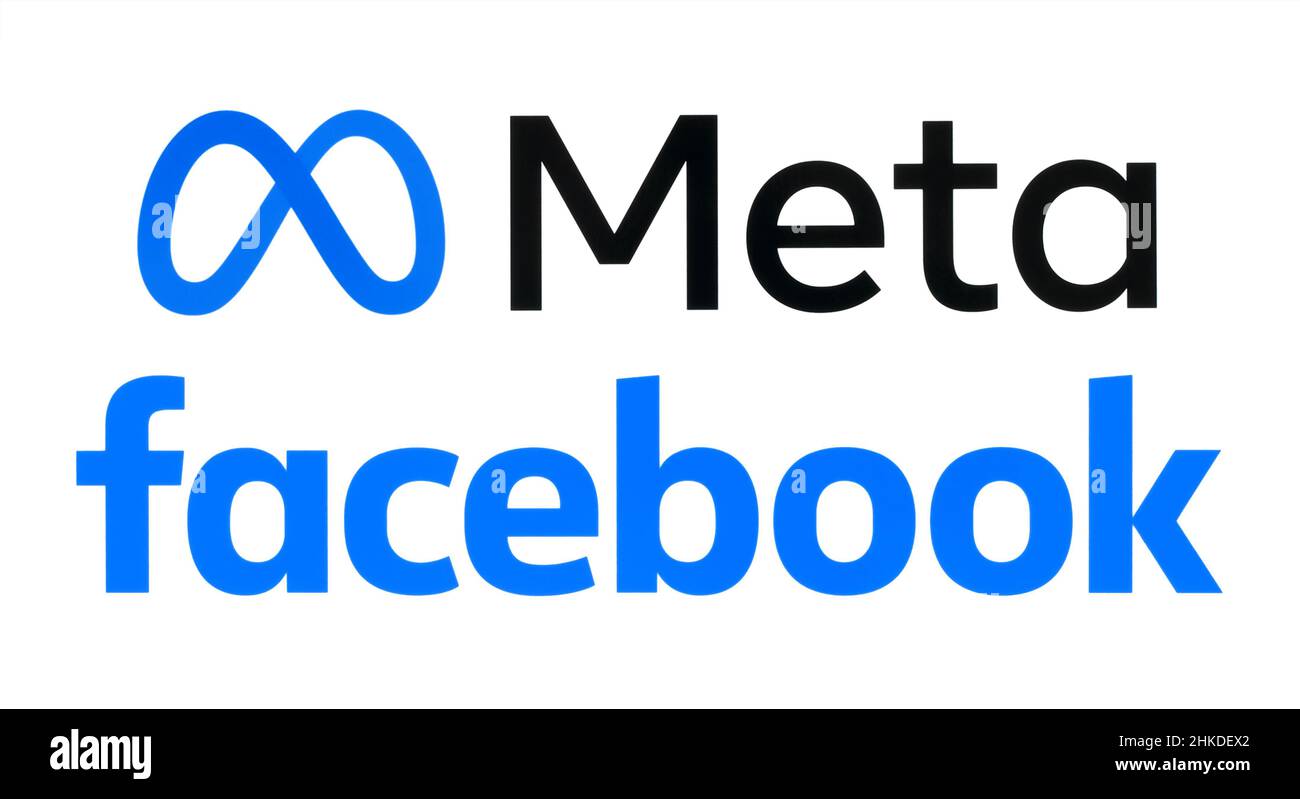 Kiev, Ucraina - 29 ottobre 2021: Logo meta e Facebook, stampati su white paper. Il gigante dei social media Facebook sta remarchiando come Meta, CEO Mark Zuckerb Foto Stock