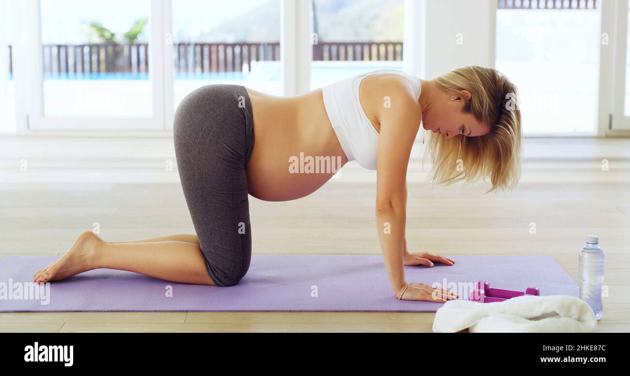 Capisce i benefici dell'esercitazione prenatale Foto Stock