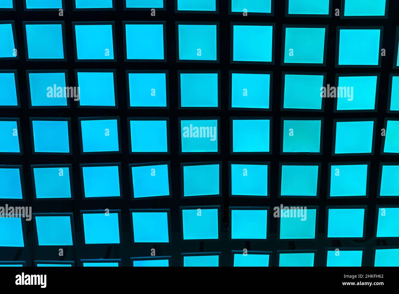 Blu neon vivaci piastrelle quadrate sfondo moderno. Foto Stock