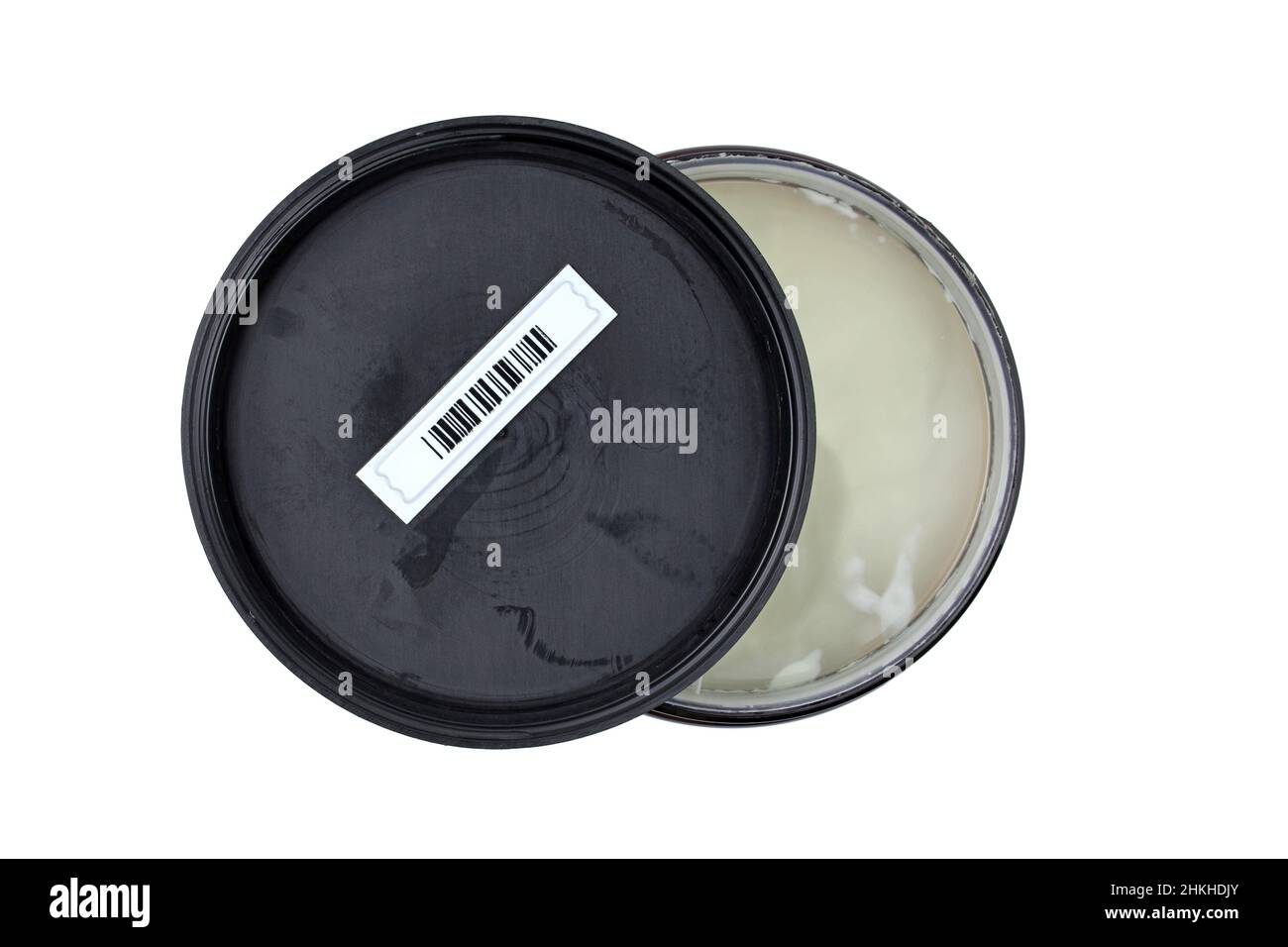 Vaso in plastica con vista dall'alto del coperchio. Applicare il codice a barre magnetico all'interno del recipiente in crema. Etichetta soft tag di sicurezza in plastica per la vendita al dettaglio con codice a barre casuale Foto Stock