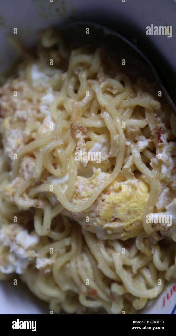 tagliatelle bollite con uova Foto Stock