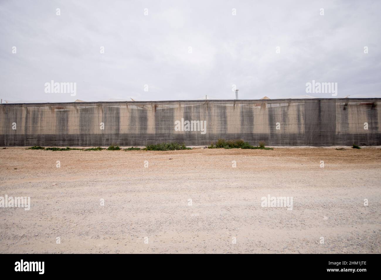 Serre di plastica in campagna Almeria, Andalusia, Spagna. Foto Stock
