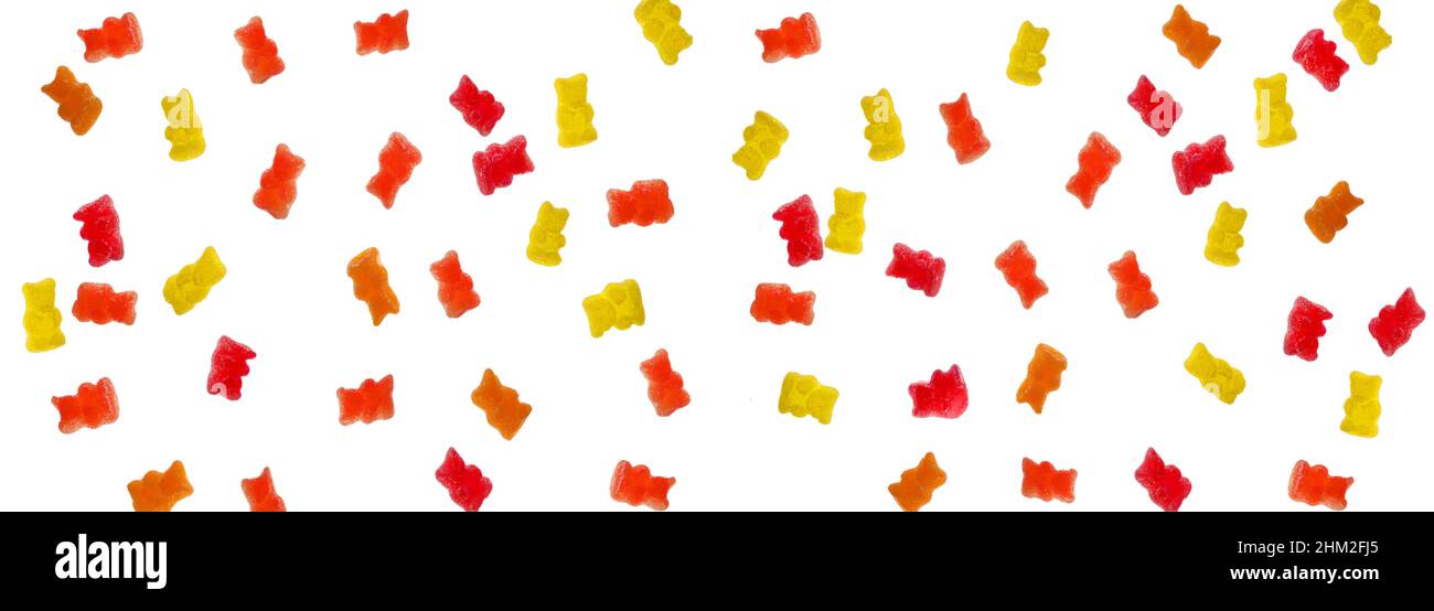 Gelatina porta caramelle isolato su uno sfondo bianco. Gelatina porta assortiti su sfondo bianco.modello dolce in giallo e rosso. Dolci e. Foto Stock