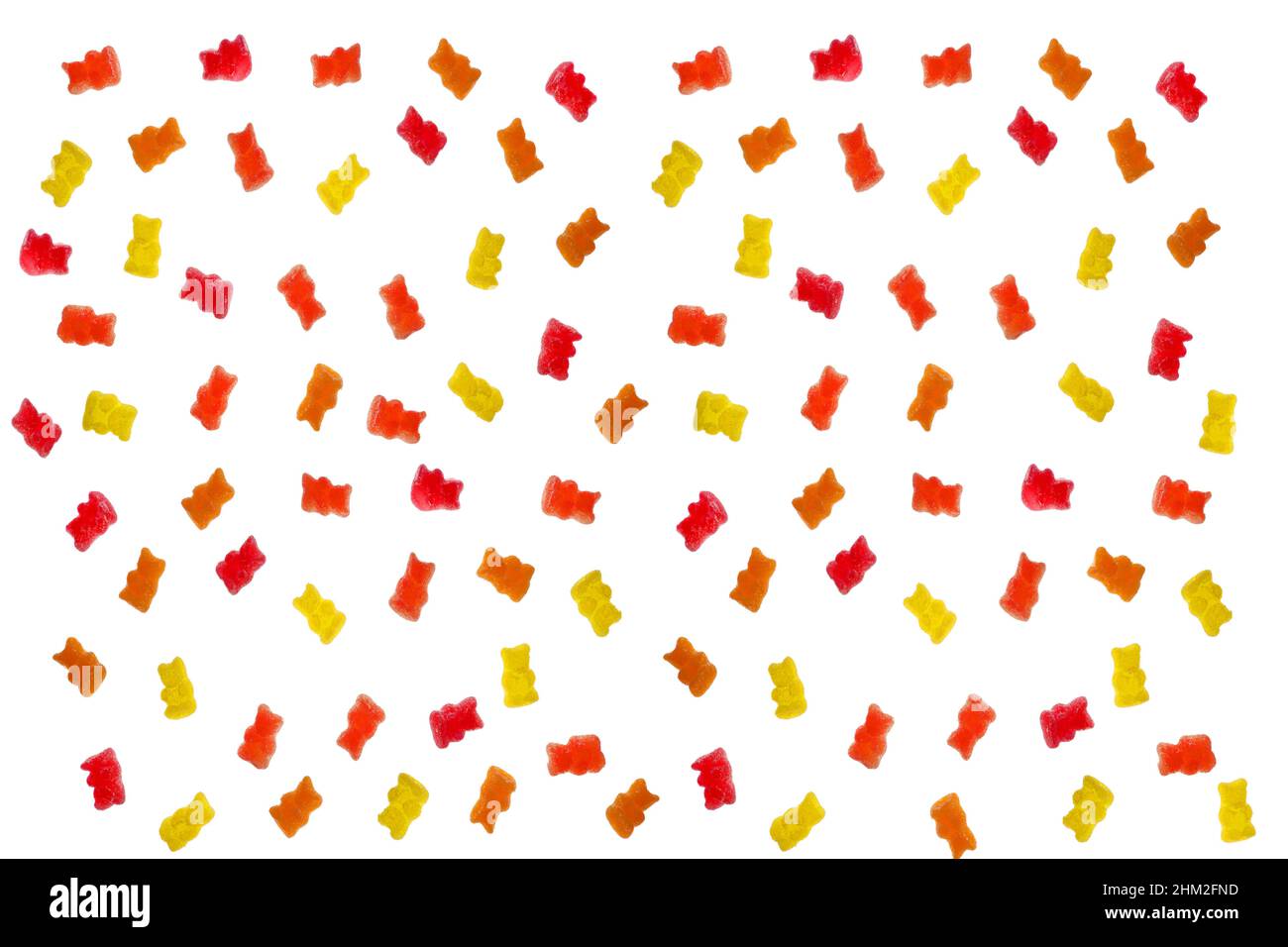 Gelatina porta caramelle isolato su uno sfondo bianco. Pappa multicolore orsacchiotti assortiti su sfondo bianco. Modello dolce in giallo e rosso Foto Stock