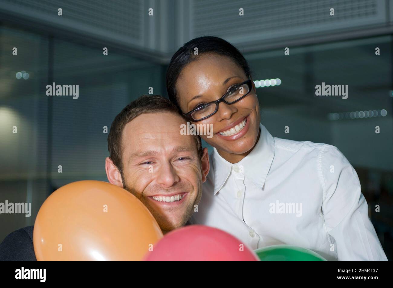 Ritratto di un uomo d'affari con una donna che sorride, Credit:Photoshot Creative / Stuart Cox / Avalon Foto Stock