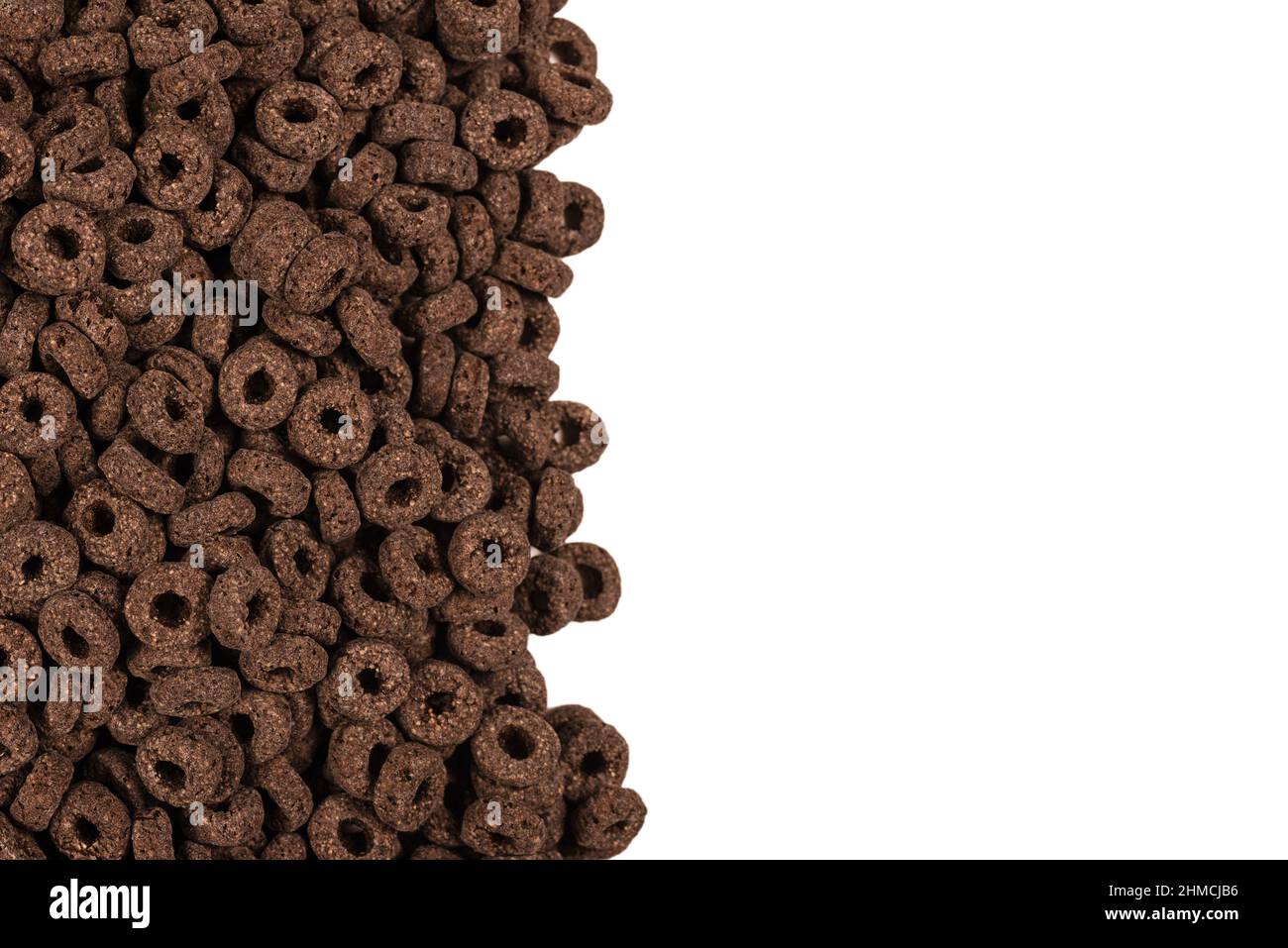 Sfondo e texture corn-flakes. Anelli di cioccolato. Foto Stock