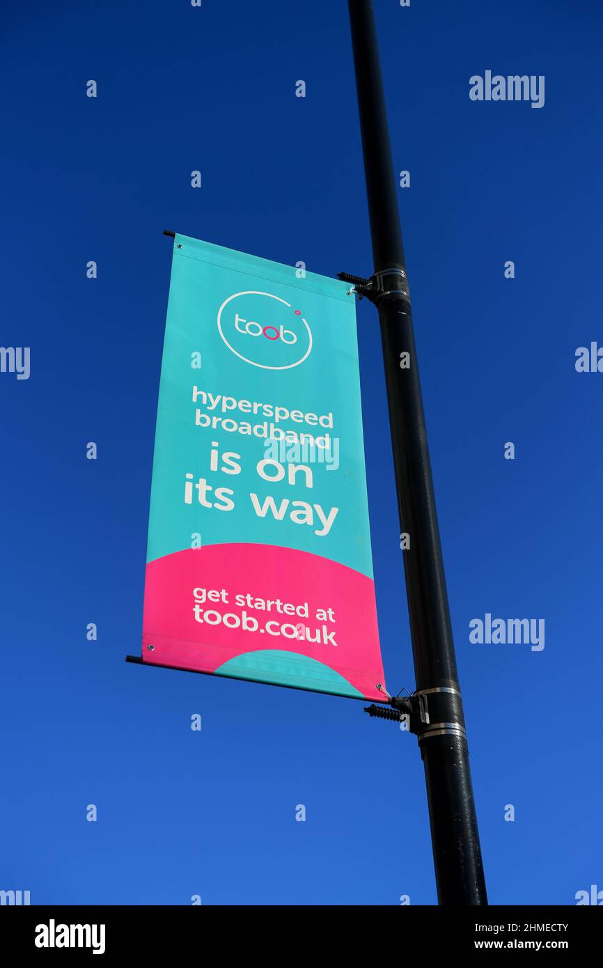 Pubblicità strada lampione banner pubblicità toob ipervelocità a banda larga a Southampton Inghilterra Regno Unito. Foto Stock