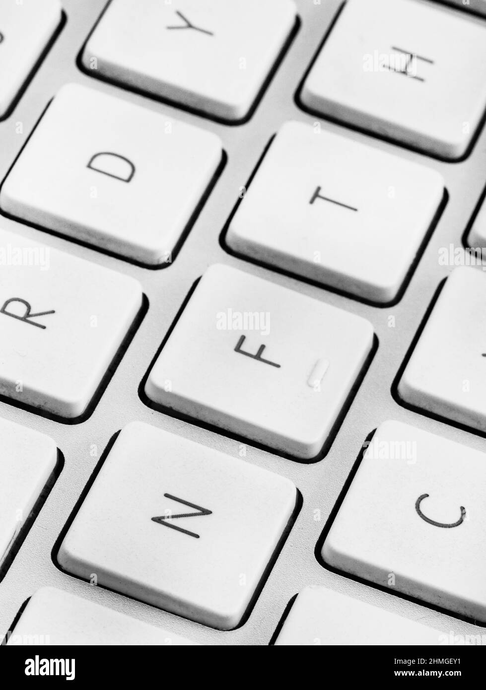 Token non-fungibile o concetto NFT, NFT scritto sulla tastiera del computer Foto Stock