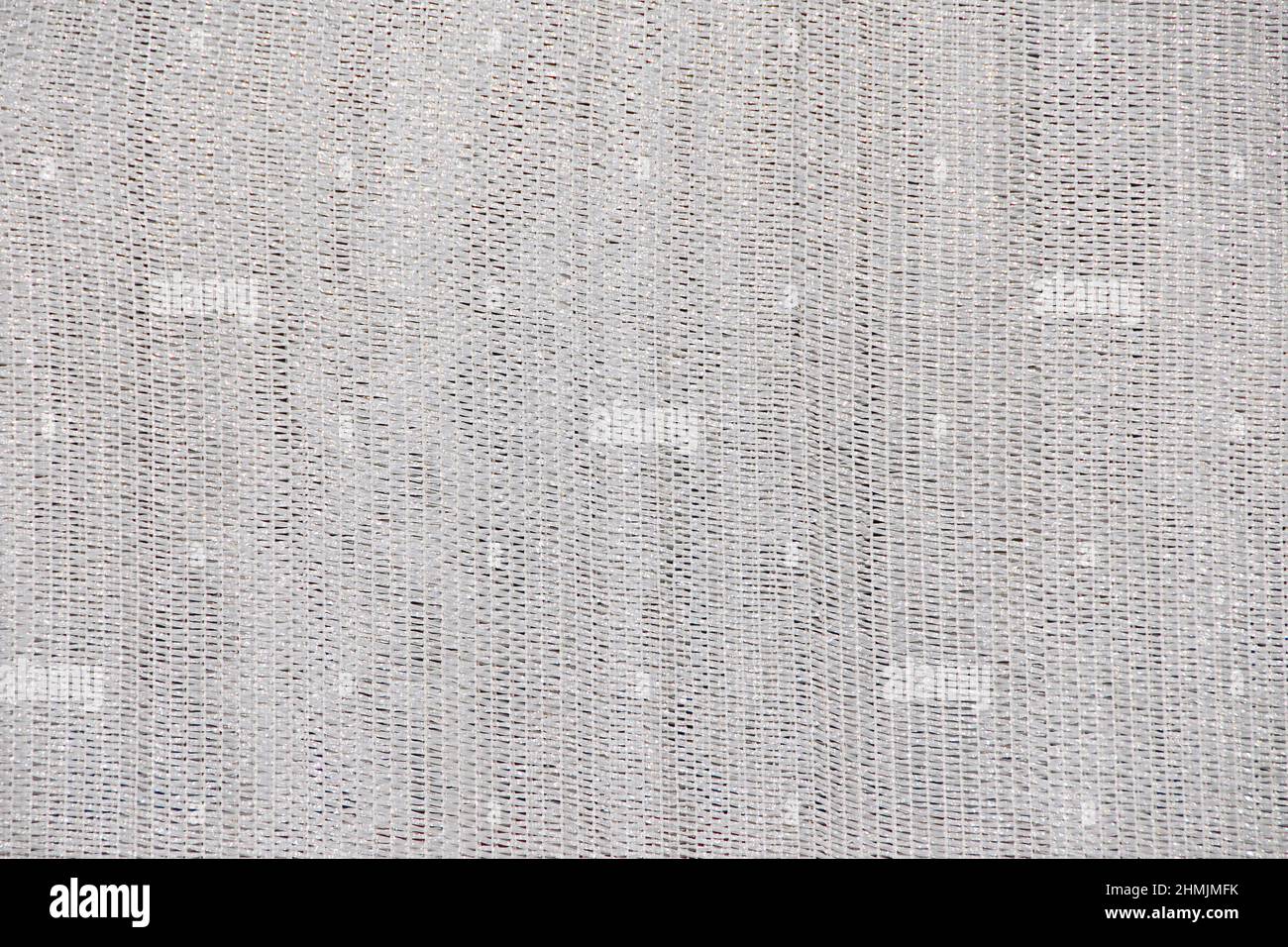 Tessuto in fibra di plastica bianca come sfondo Foto Stock