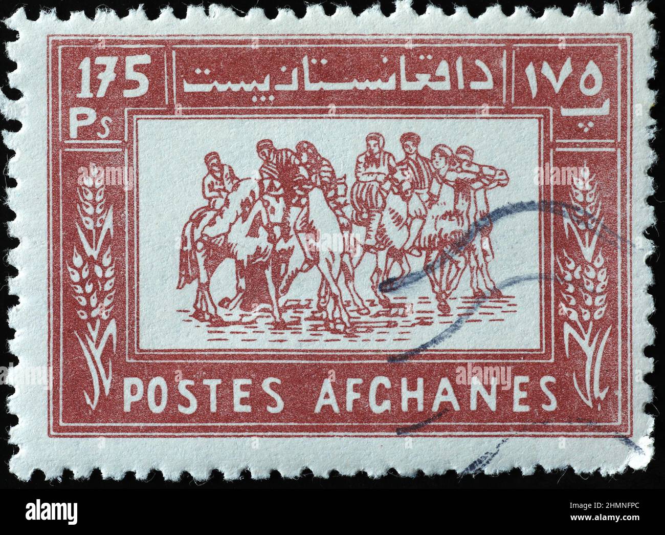 Sport tradizionale Buzkashi sul francobollo afghano Foto Stock