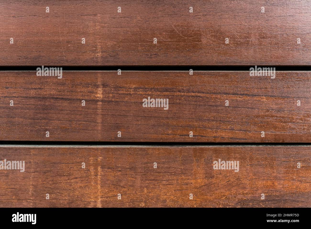 tre assi di legno verniciato rossastro. tessuto di fondo di legno vettoriale Foto Stock