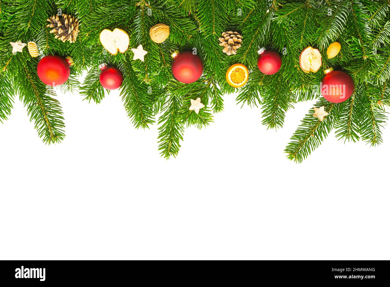 decorazioni natalizie su rami di pino Foto Stock