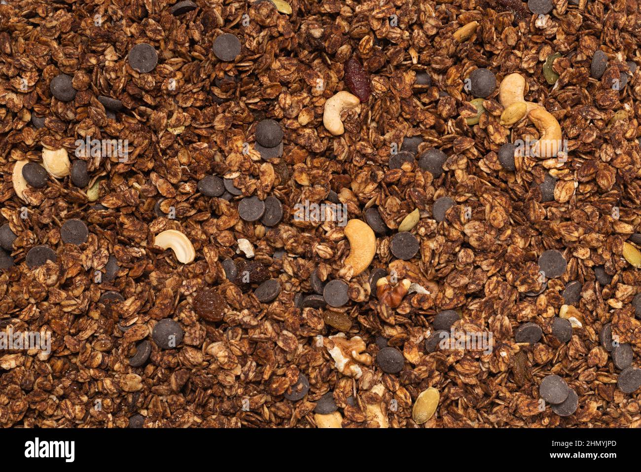 Cereali al cioccolato con fondo a nocciole. Vista dall'alto. Foto Stock