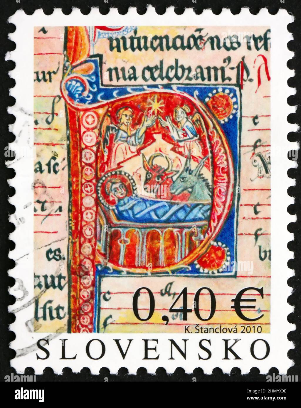 SLOVACCHIA - CIRCA 2010: Un francobollo stampato in Slovacchia mostra iniziale con la nascita di Cristo da Bratislava Mass-book, Natale, circa 2010 Foto Stock