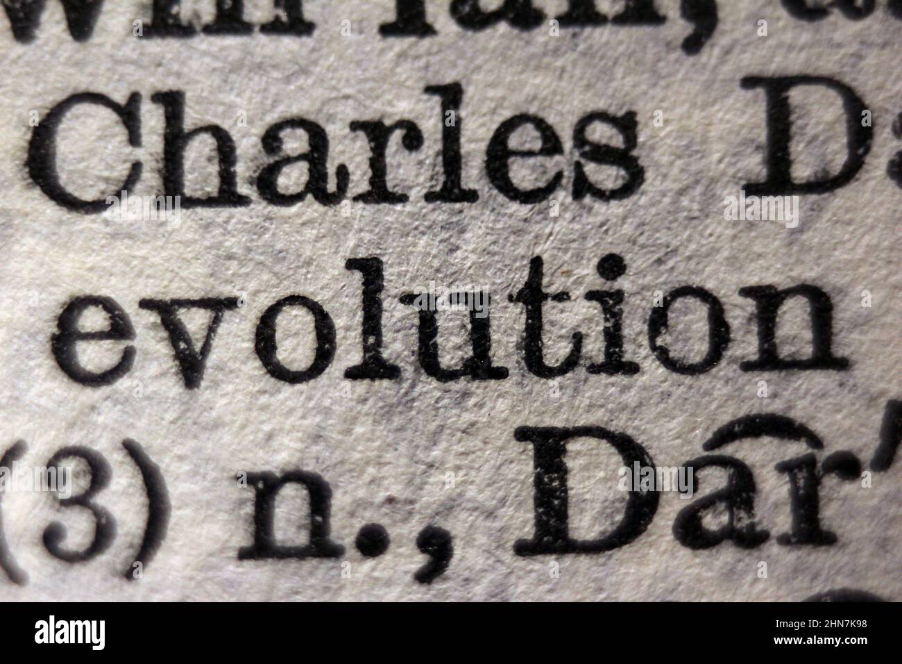 Evoluzione della parola stampata sulla pagina del dizionario Charles Darwin, primo piano macro Foto Stock