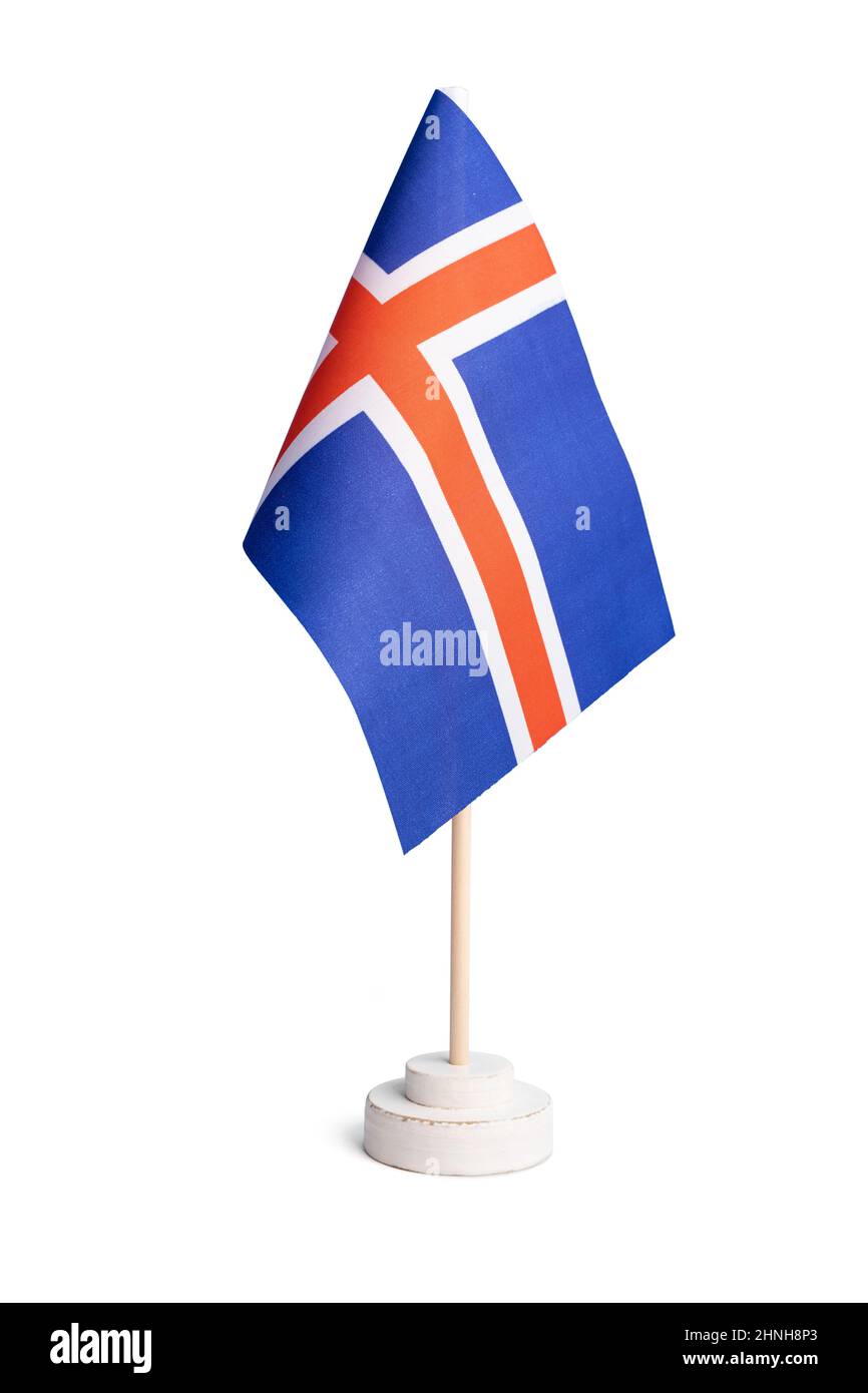 Piccola bandiera da tavolo dell'Islanda isolata su sfondo bianco Foto Stock