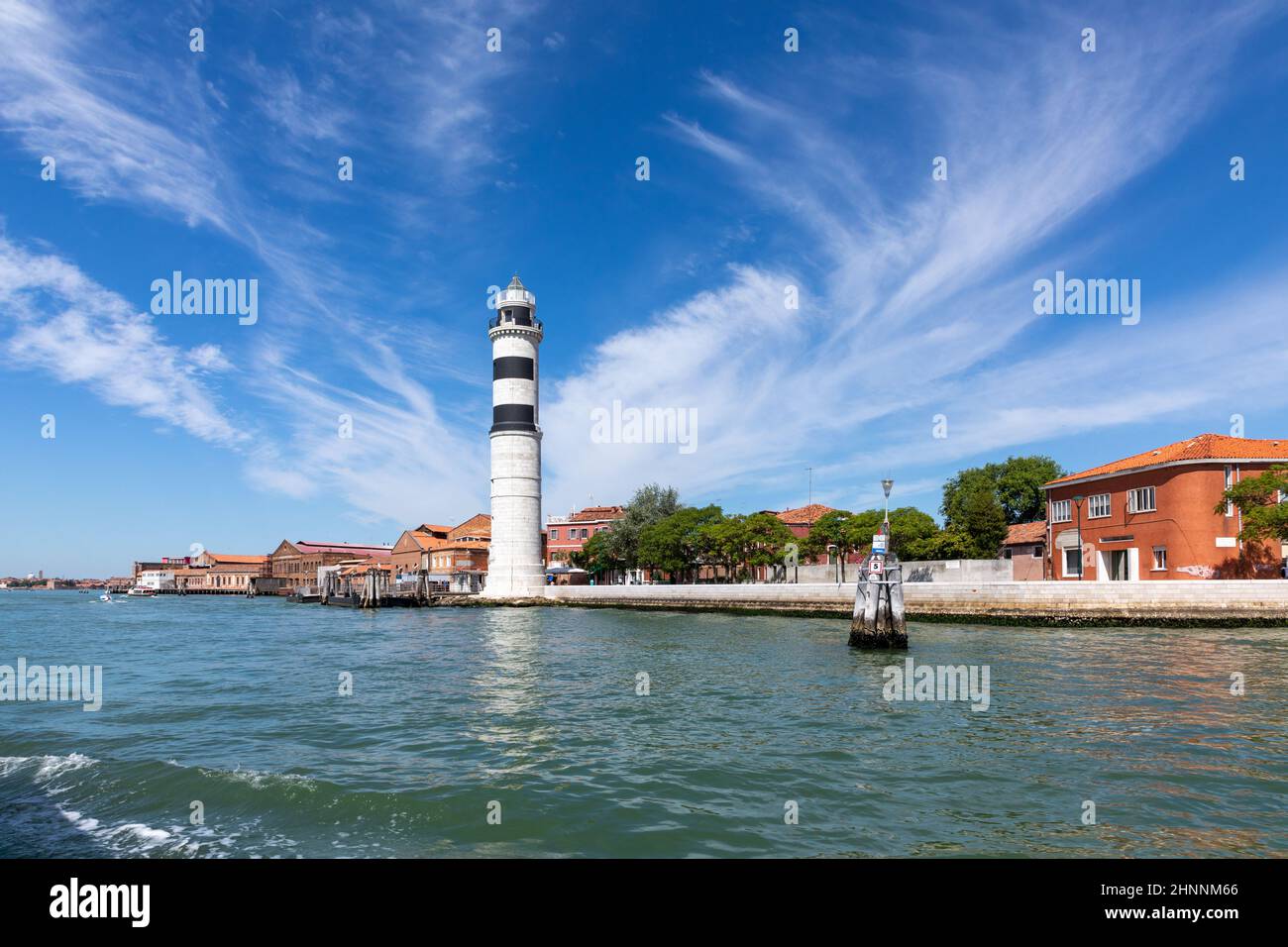 faro di Murano, l'isola di venezia con la storica industria della soffiatura del vetro. Foto Stock