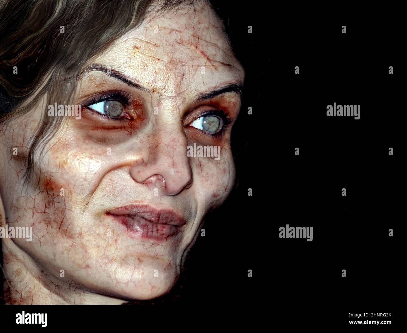 Un Zombie femmina non morto su sfondo nero Foto Stock