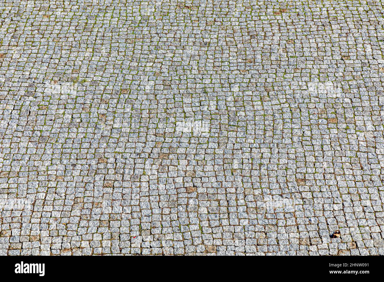modello di vecchia strada di pietra di cobble come sfondo armonico Foto Stock