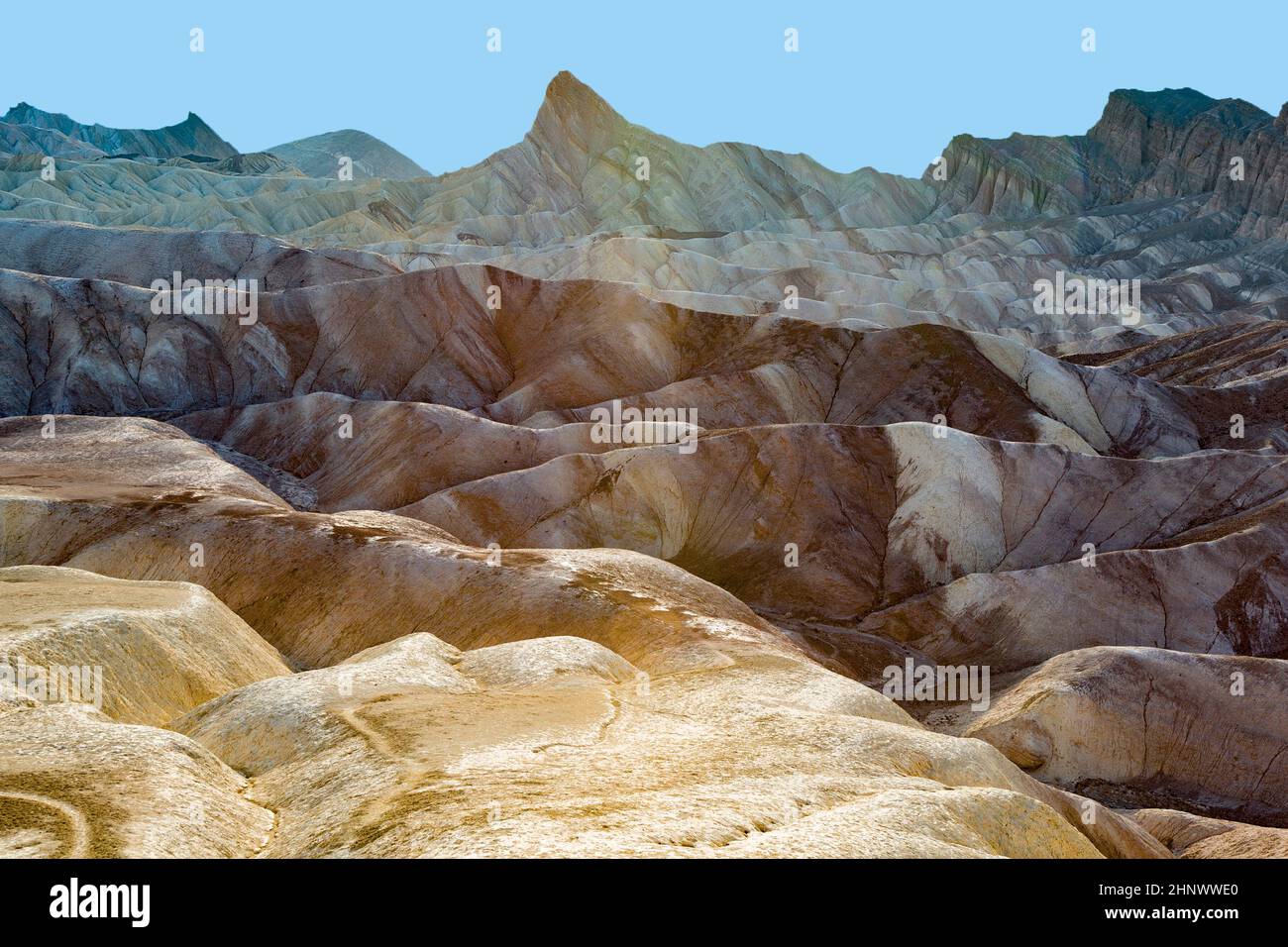 Il pittoresco morbide onde da multi-colore di pietra arenaria. Valle della Morte, Zabriski - un punto su un tramonto Foto Stock