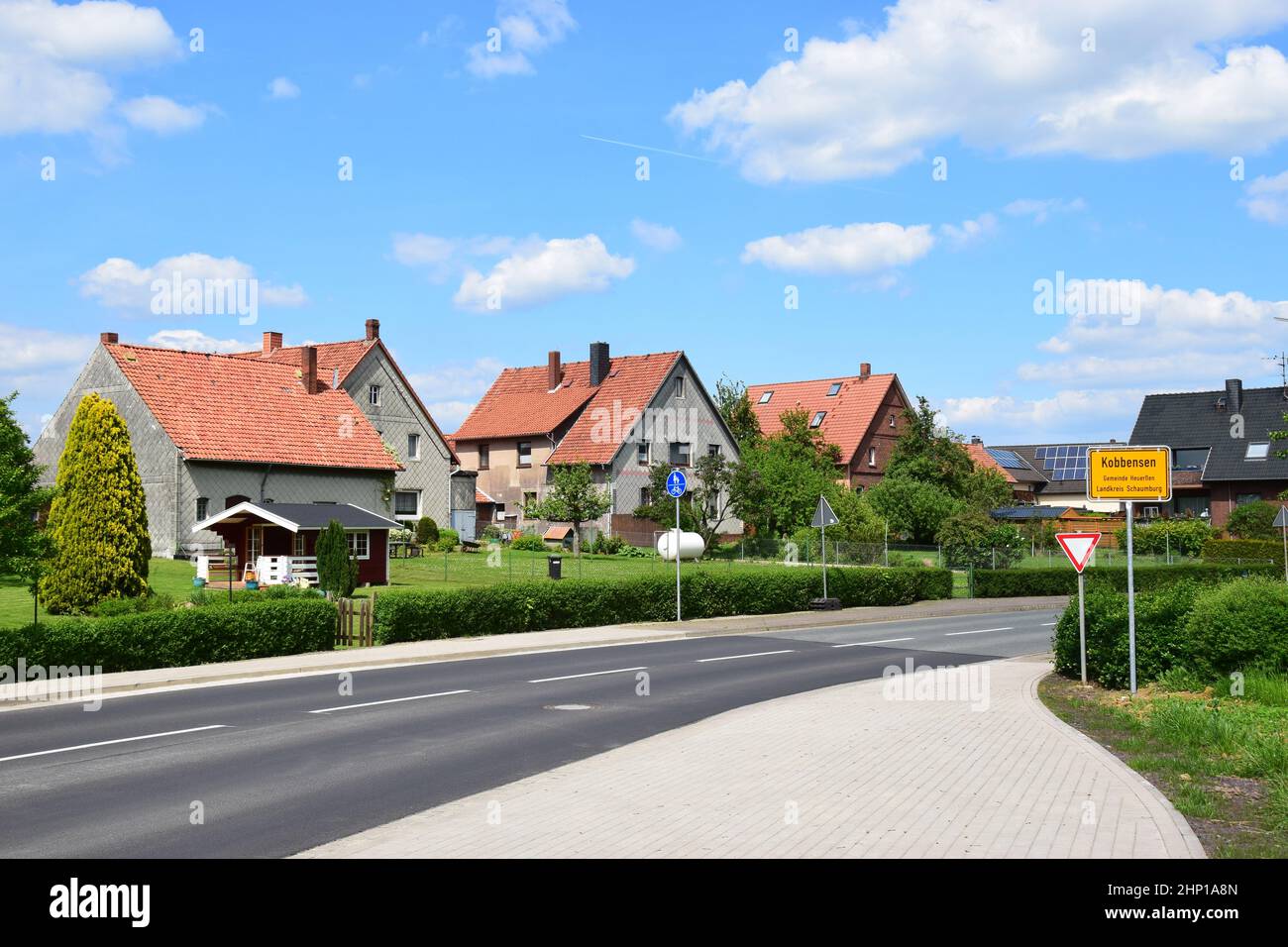 Village Street a Kobbensen/Schaumburg con case tradizionali Foto Stock