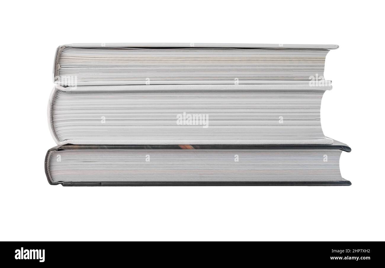 I libri hardback si impilano isolati su sfondo bianco. Istruzione, hobby di lettura, concetto di saggezza. Foto di alta qualità Foto Stock