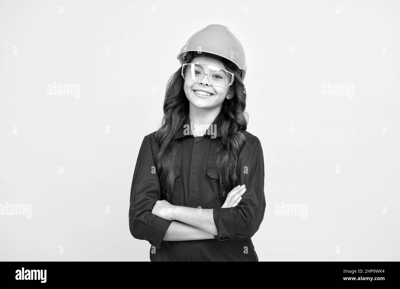 appena nel buon umore. giorno di lavoro. sviluppo di infanzia. ragazza teen in occhiali protettivi. Foto Stock