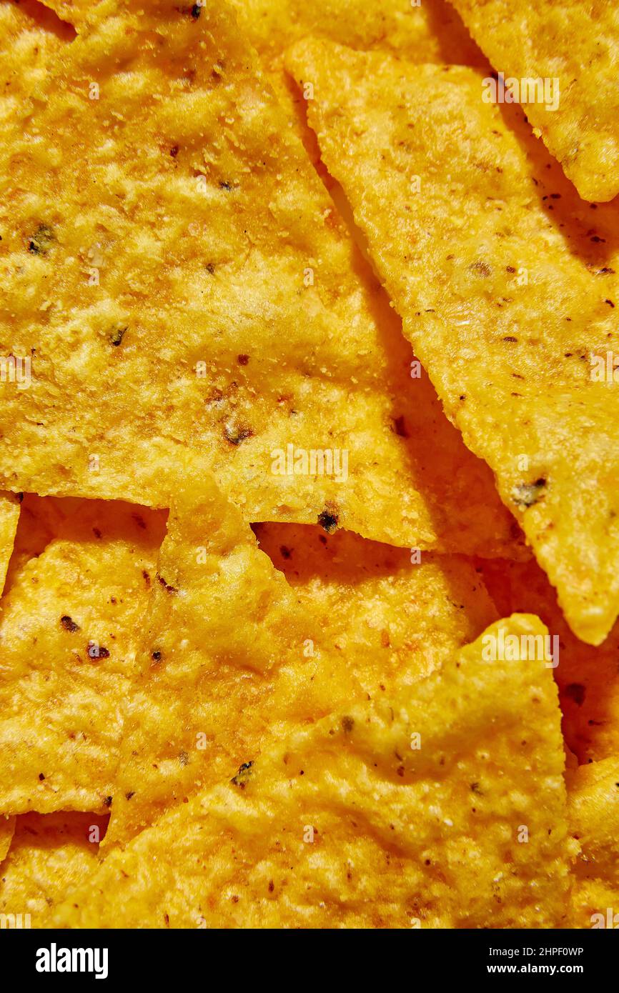 Chip macro nacho piatto, sfondo di chip Tortilla Corn Foto Stock