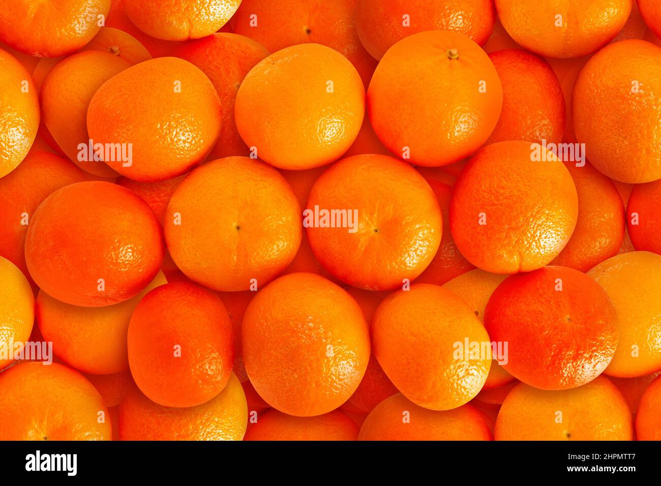 Texture foto perfetta sullo sfondo, mucchio di frutti d'arancia. Foto Stock