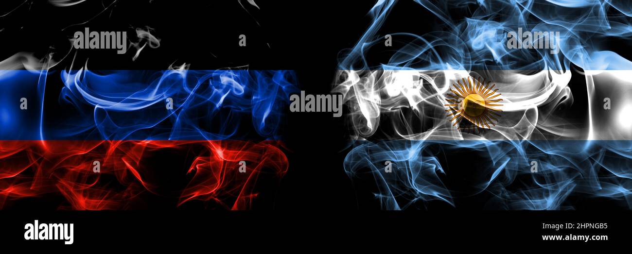 Donetsk Repubblica popolare vs Argentina, Argentina, bandiera argentina, argentina. Bandiere di fumo affiancate isolate su sfondo nero. Foto Stock